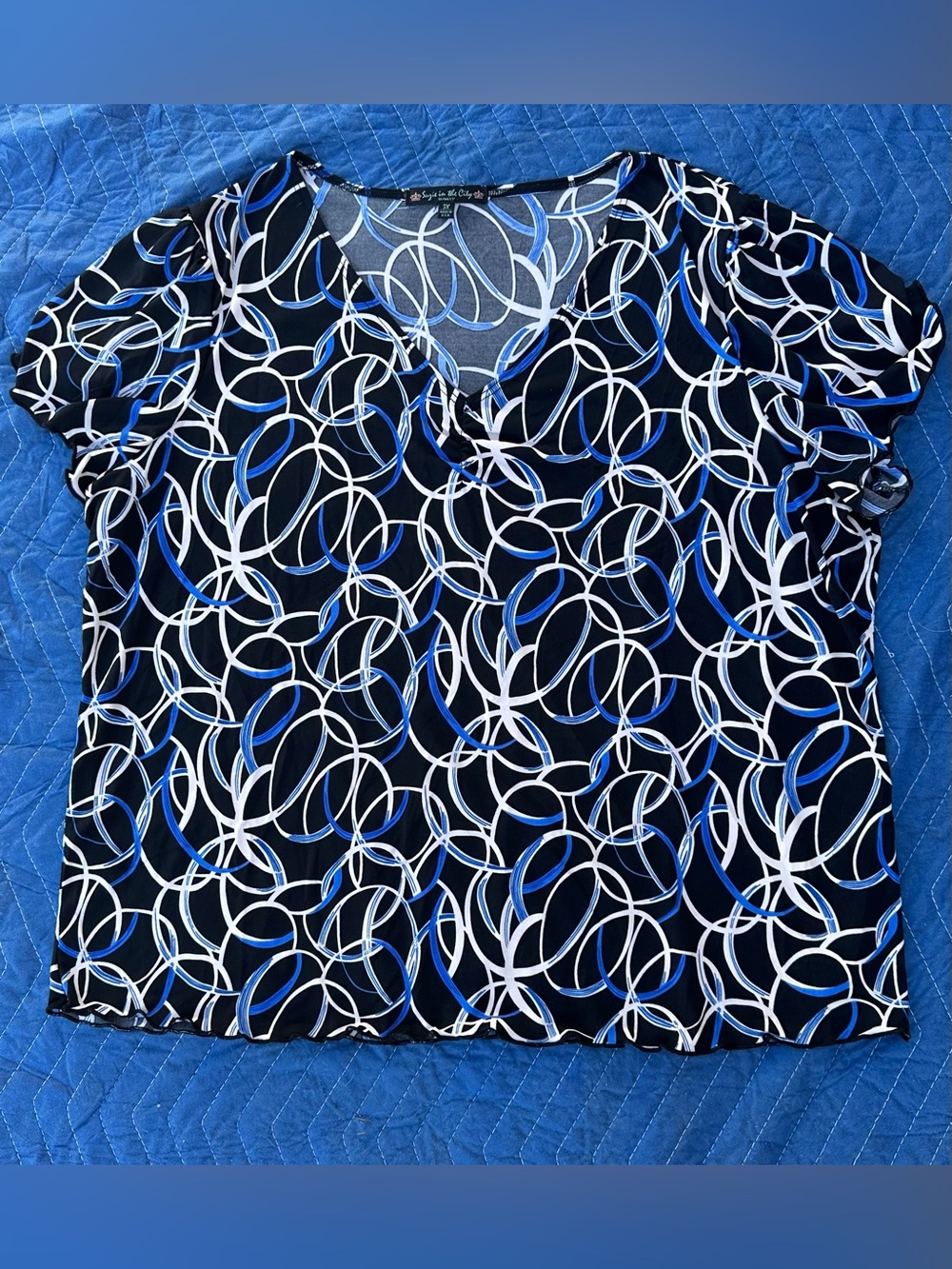 Suzie In The City Black Top with Blue & White Ring Print